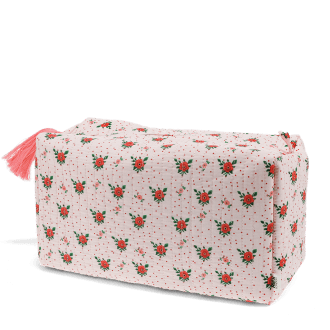 Rectangular makeup bag in pale pink with a floral pattern of small red and green flowers