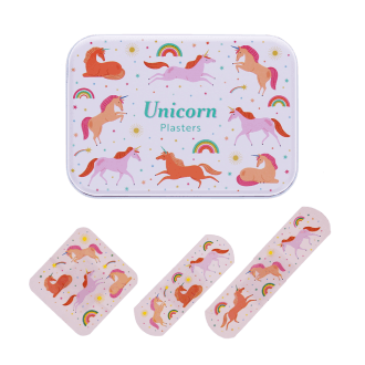Unicorn-printed plasters placed beside a matching storage tin featuring rainbow and unicorn illustrations