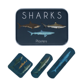 Sharks-printed plasters placed beside a matching storage tin featuring sharks illustrations