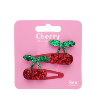 Pair of red glitter cherry hair clips with green glitter leaves in packaging