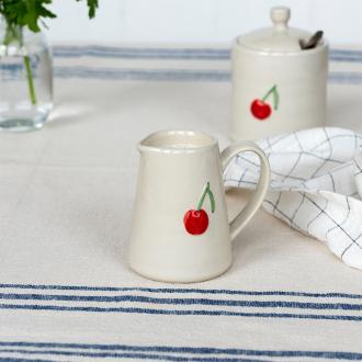 Stoneware milk jug featuring cherry print with handle 