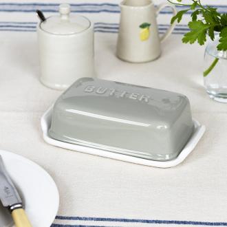 Rectangular butter dish with grey lid embossed with the word 'BUTTER