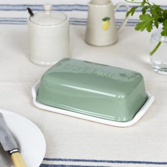 Rectangular butter dish with green lid embossed with the word 'BUTTER