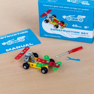 Completed colourful racing car model displayed with its packaging box