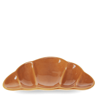 Brown ceramic trinket dish shaped like a croissant.