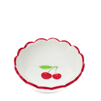 Round ceramic trinket dish with scalloped red edge and cherry design in the center.