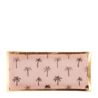 Rectangular trinket dish with gold rim and palm tree pattern on a pink background