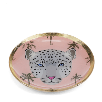 Round trinket dish with gold rim, pink background, palm tree pattern, and a leopard face design