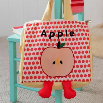 Yellow handbag with red polka dots and a cartoon apple design with two red feet at the bottom