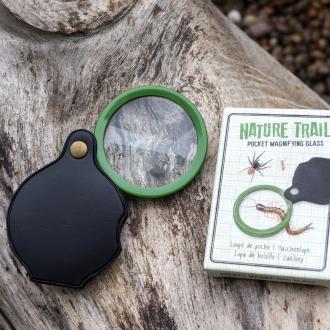 Nature Trail pocket magnifying glass with green frame, black leather case, and illustrated packaging.
