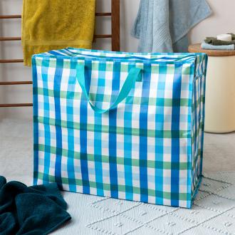 Large storage bag with a multi‑coloured gingham pattern and turquoise handles.