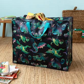 Large storage bag with a multi‑coloured dragons on a dark blue background and turquoise handles.