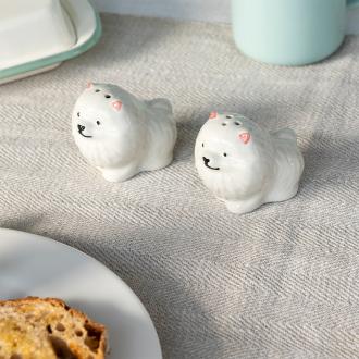 Dog‑shaped ceramic salt and pepper shakers .