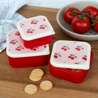 A set of three cherry‑pattern snack boxes displayed with cookies.