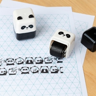 Panda-themed roller stamp with the cap removed, 