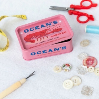Pink mini storage tin with lid featuring lobster print