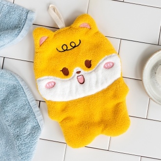 Soft yellow flannel face cloth in a dog shape.