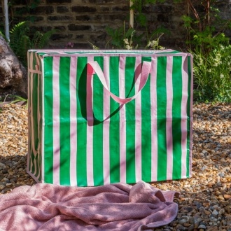 Green and pink striped jumbo storage bag with handle.