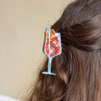 Hair claw clip featuring a zesty Aperitivo Spritz cocktail design, with hints of marbling and translucence. 