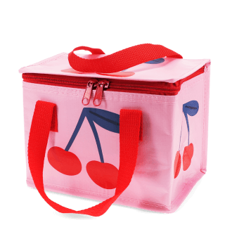 Pink insulated lunch bag with a bold cherry design and red handles.