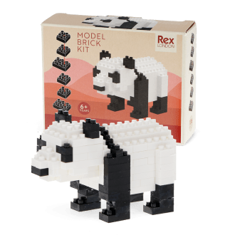 Completed panda brick model displayed beside its packaging box.