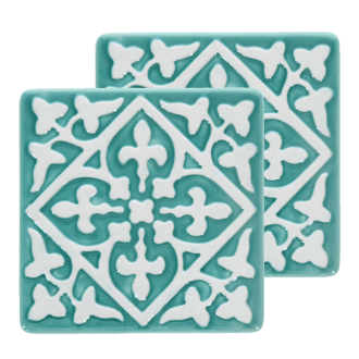Set of two turquoise ceramic coaster with embossed pattern.