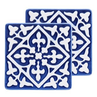 Set of two blue ceramic coaster with embossed pattern.