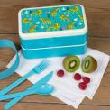 Turquoise plastic bento box with cream lid and middle tray featuring print of cheetahs