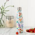 Medium size white stainless steel water bottle with silver lid featuring floral pattern