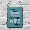 Succeed metal wall sign