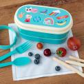 Turquoise plastic bento box with cream lid and middle tray featuring retro style top banana print