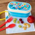 Light blue plastic bento box with cream lid and middle tray featuring print of butterflies amongst flowers