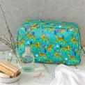 Turquoise oilcloth wash bag with print of cheetahs