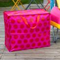 Recycled plastic jumbo storage bag red circles pink background