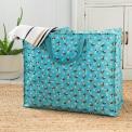 Turquoise jumbo storage bag with print of bumblebees