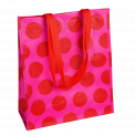 Recycled plastic shopping bag in pink with red spots