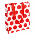 Recycled plastic shopping bag in cream with red spots
