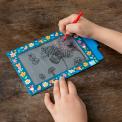 Child drawing on Fairies in the Garden Magic Slate