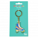 Keyring with roller skate charm attached to packaging