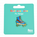 Roller skate pin badge attached to packaging
