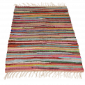 Multicoloured handloomed cotton rug laid flat
