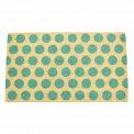 Coir doormat with turquoise spots on natural coloured surface