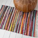 Handloomed multicoloured cotton rug