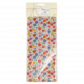Tilde tissue paper sheets in packaging