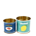 Mini metal storage tins in blue and teal with Moroccan lemons and Rose harissa branding