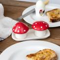 Red mushroom-shaped salt and pepper shakers.