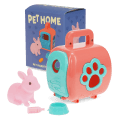 pet carrier with pink rabbit and packaging box in the background