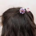 Mini hair claw clips for children, Featuring detailed seashell designs.