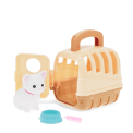 pet carrier with white cat and a blue bowl