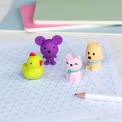 Four animal-shaped erasers in different colours.